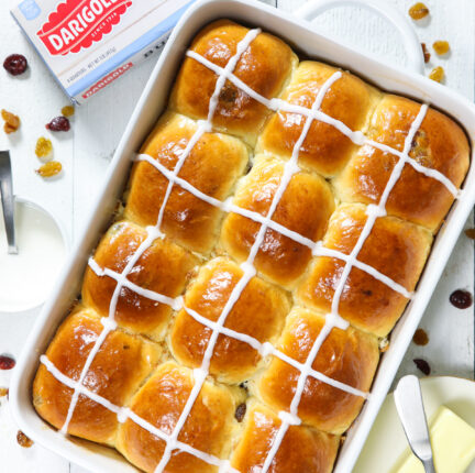 A pan of bake good with frosting